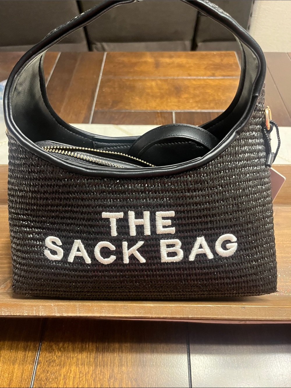 Black THE SACK BAG Woven Shoulder Bag with matching wallet